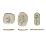 A hand-painted stoneware plate with a reactive glaze finish, one of three styles