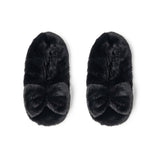 A pair of plush Hello Mello Cuddlers heated slippers