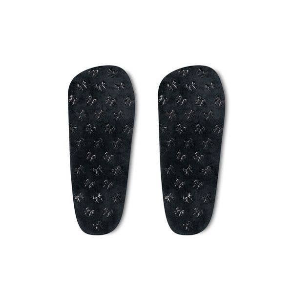 A pair of plush Hello Mello Cuddlers heated slippers