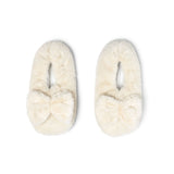 A pair of plush Hello Mello Cuddlers heated slippers
