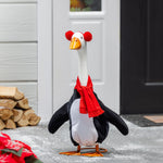 Porch goose in a winter penguin outfit