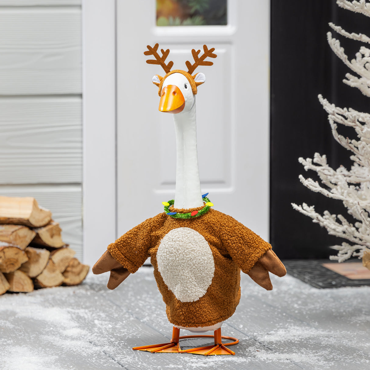 Porch goose in a reindeer outfit