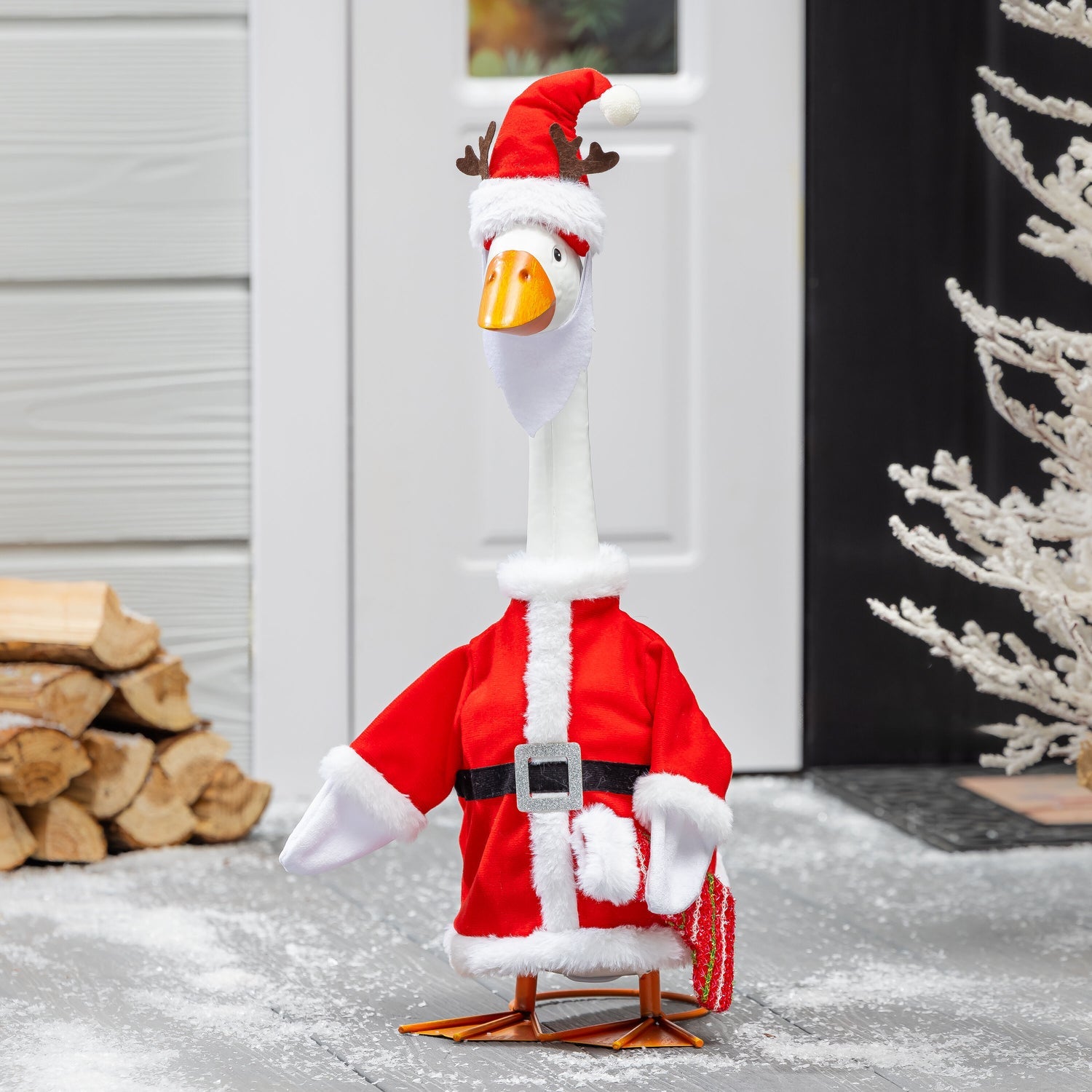 Porch goose in a Mr. Claus outfit