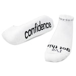 White socks with black text on a white background