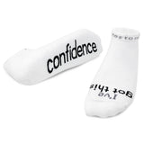 White socks with black text on a white background