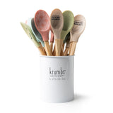 A wooden-handled Krumbs Kitchen Farmhouse spoon