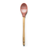 A wooden-handled Krumbs Kitchen Farmhouse spoon