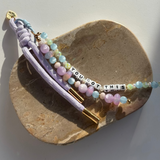 Little Words Project Beaded bracelet with motivational message on a stone surface