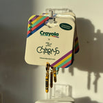 Crayola x Little Words Project charm with colorful packaging on a white background