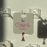 Gold letter 'A' charm on a 'little words project' card against a white background 