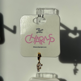 Gold F charm on a 'Little Words Project' card with a white background