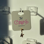 Gold charm with 'K' on a 'little words project 
