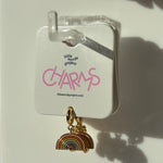 Rainbow charm on a card with 'little words project' branding