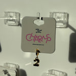 Gold charm with number '2' on a 'CHARMS' branded card against a white background
