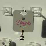 Gold charm with number '2' on a 'CHARMS' branded card against a white background