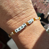 Little words project bracelet show up