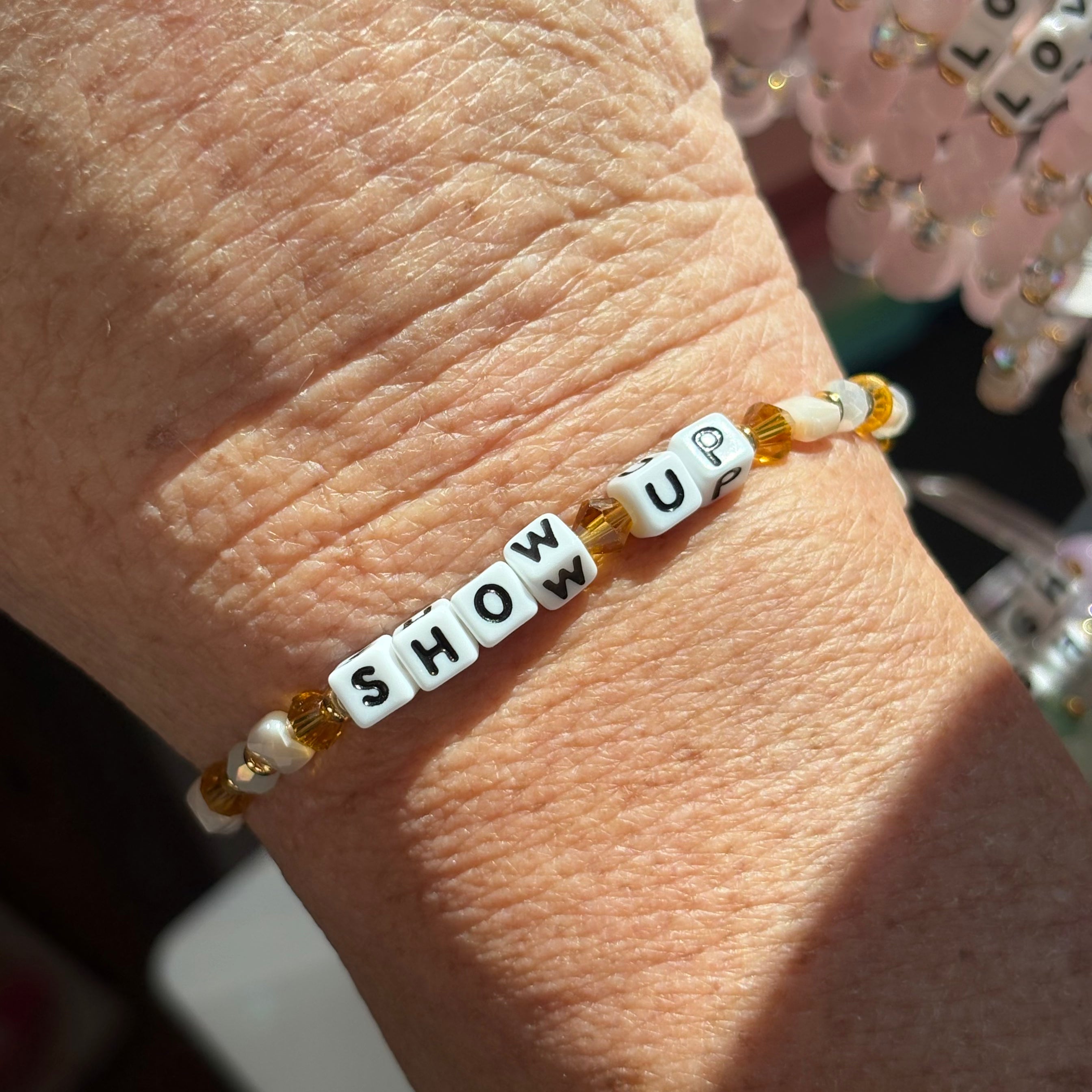 Little words project bracelet show up