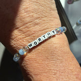 Little words project worthy with blue beads