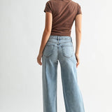 Medium wash high-rise stretchy wide leg jeans