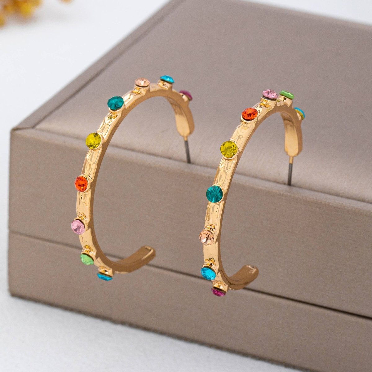 Multi-color gemstone hoop earrings in gold-tone