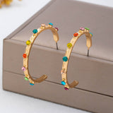 Multi-color gemstone hoop earrings in gold-tone