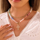 Multi layer gold-tone necklace with resin beaded pendant