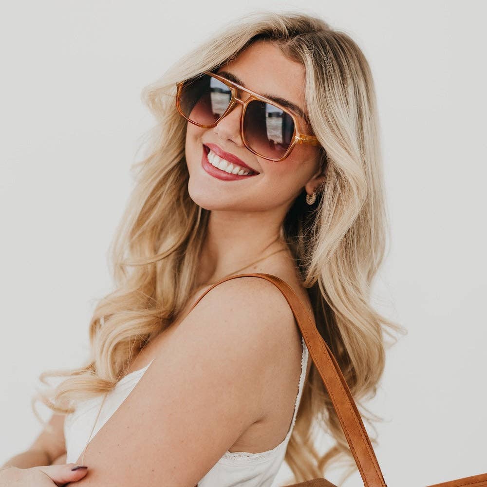 Oversized aviator sunglasses with a soft-cloth case