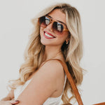 Oversized aviator sunglasses with a soft-cloth case