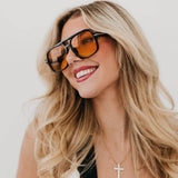 Oversized aviator sunglasses with a soft-cloth case