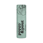 Lip balm container with 'Poppy & Pout' branding on a green background
