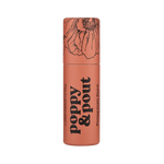 Lip balm container with 'Poppy & Pout' branding on a green background