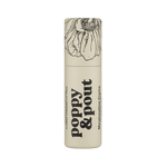 Lip balm container with 'Poppy & Pout' branding on a green background