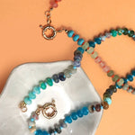 Natural stone charm necklace with spring clasp closure