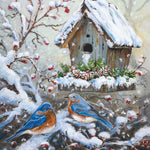 Jigsaw puzzle box for Nestled in Hope, featuring two bluebirds by a snowy birdhouse
