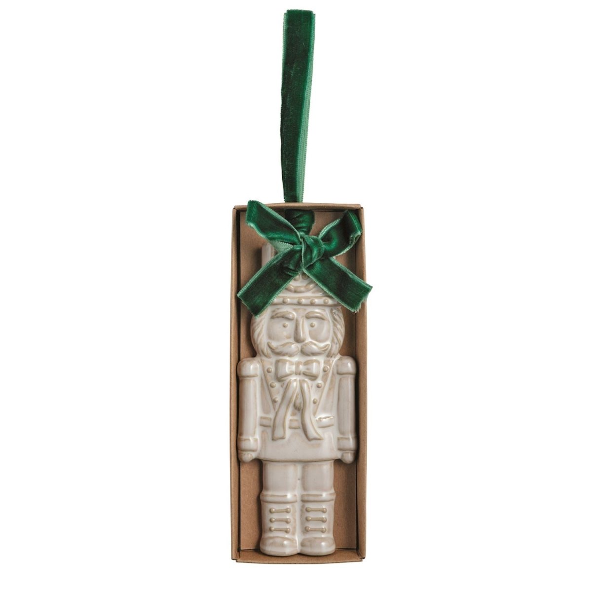 Ceramic nutcracker ornament with reactive glaze and a velvet ribbon bow