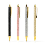 An Olivia Moss Glitter Bomb pen filled with floating glitter