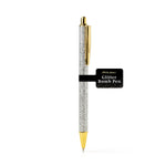 An Olivia Moss Glitter Bomb pen filled with floating glitter