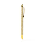An Olivia Moss Glitter Bomb pen filled with floating glitter