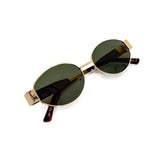 Oval sunglasses with a gold frame and brown lenses