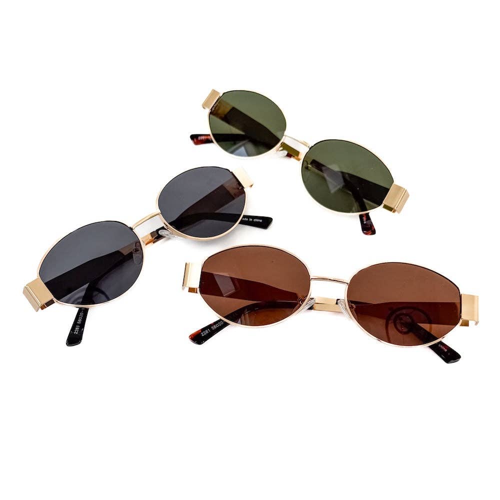 Oval sunglasses with a gold frame and brown lenses