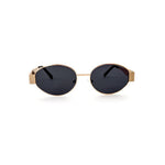 Oval sunglasses with a gold frame and brown lenses