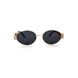 Oval sunglasses with a gold frame and brown lenses