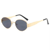 Oval sunglasses with a gold frame and brown lenses
