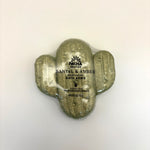 Cactus santal and amber bath bomb with 'Pacha Soap Co' branding on a beige background