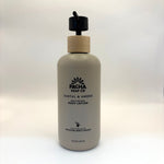 Santal and amber body lotion bottle with wooden cap on a white background