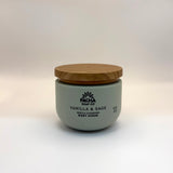 Jar of Pacha Soap Co Vanilla & Sage body scrub with wooden lid on a white background