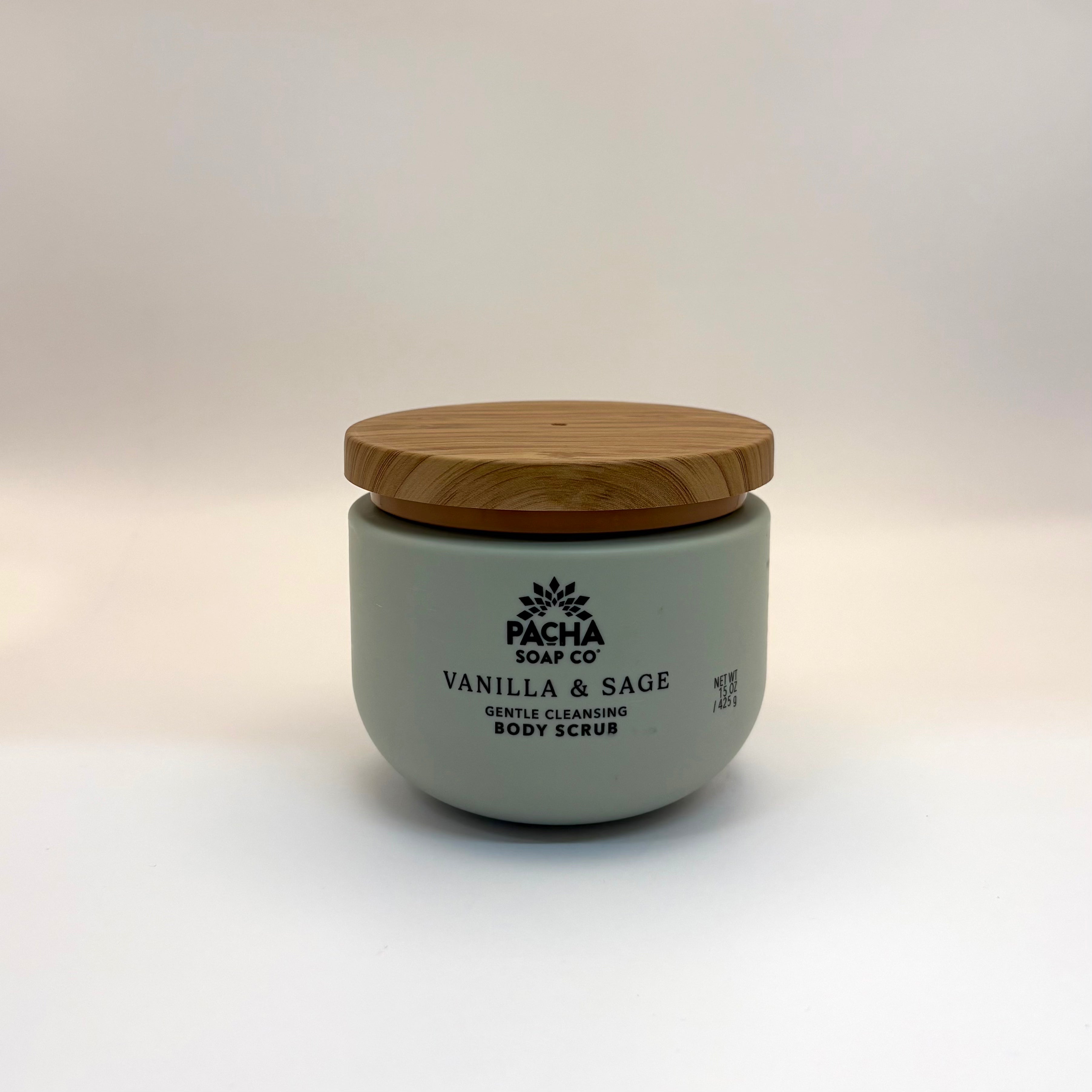 Jar of Pacha Soap Co Vanilla & Sage body scrub with wooden lid on a white background