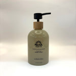 Vanilla and sage soap bottle with wooden pump from Pacha Soap Co on a light background