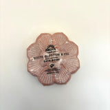 White blossom and fig bath bomb with 'Pacha Soap Co.' branding on a light background