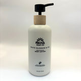 Pacha Soap Co white blossom and fig body lotion bottle with pump on a white background